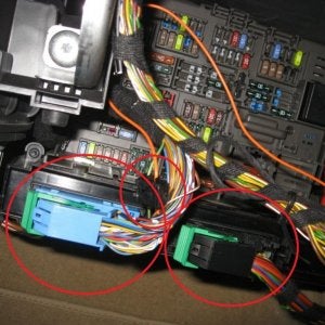wire bundle connectors under glove box and switched power connector